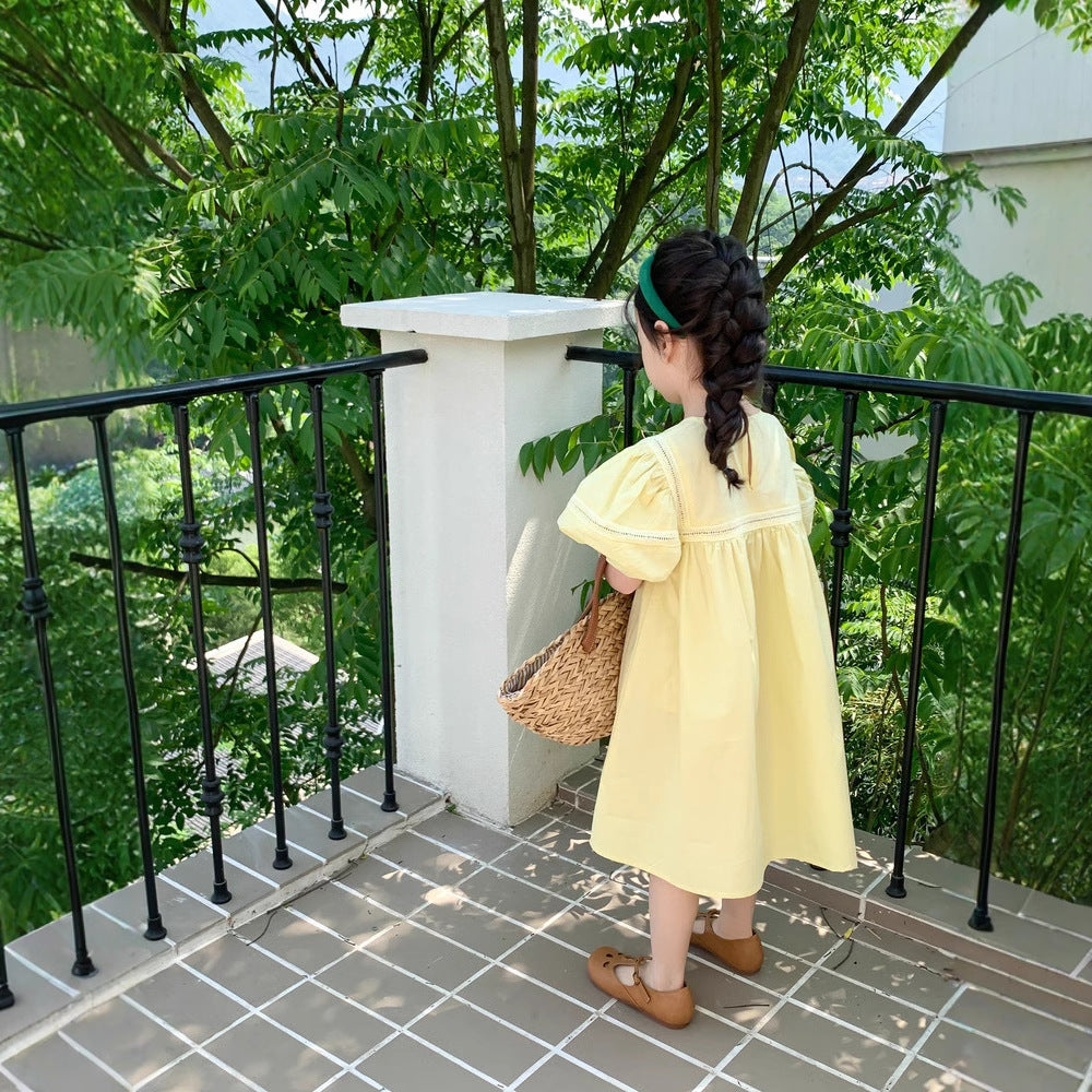 Vestido de niña con manga abullonada