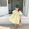 Vestido de niña con manga abullonada