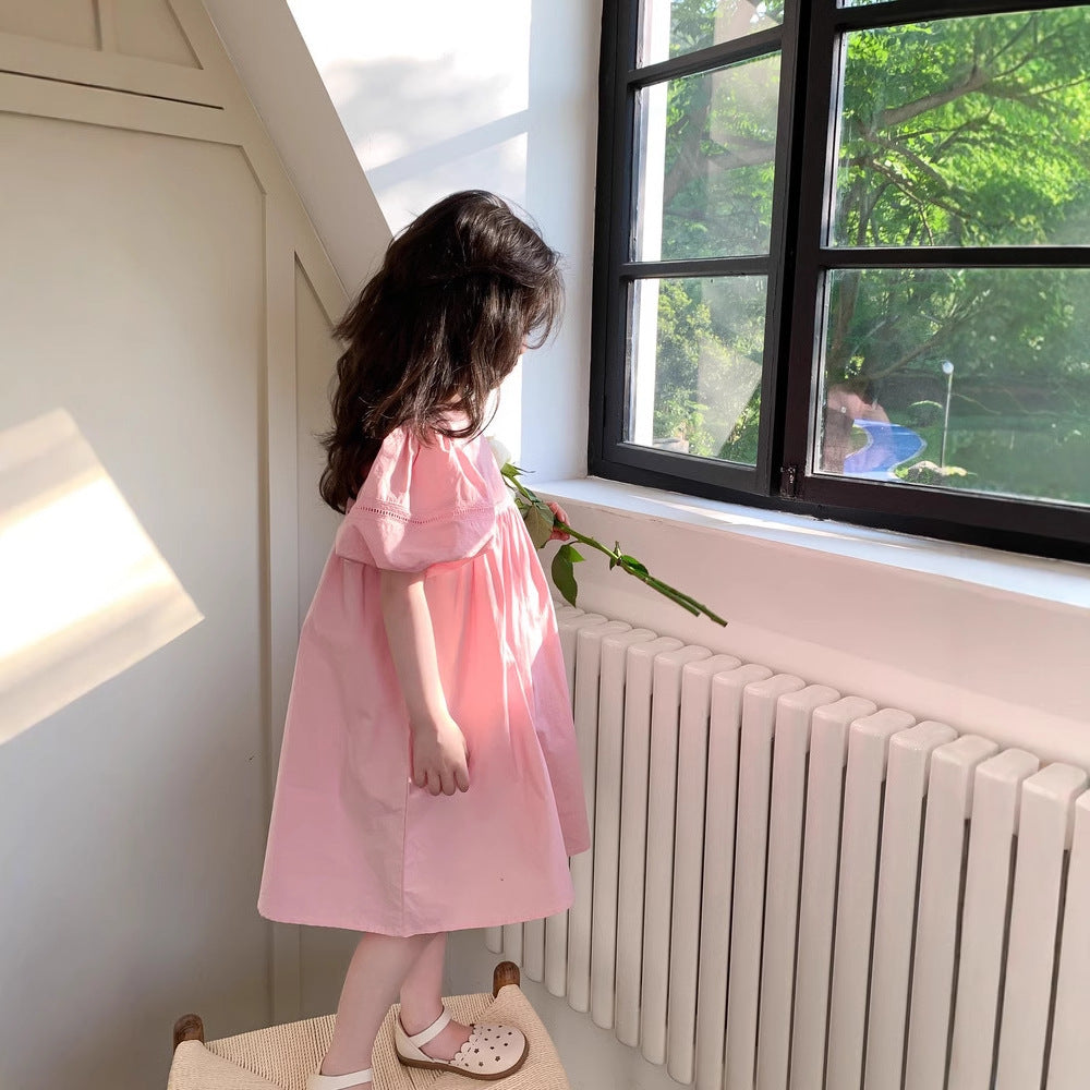 Vestido de niña con manga abullonada